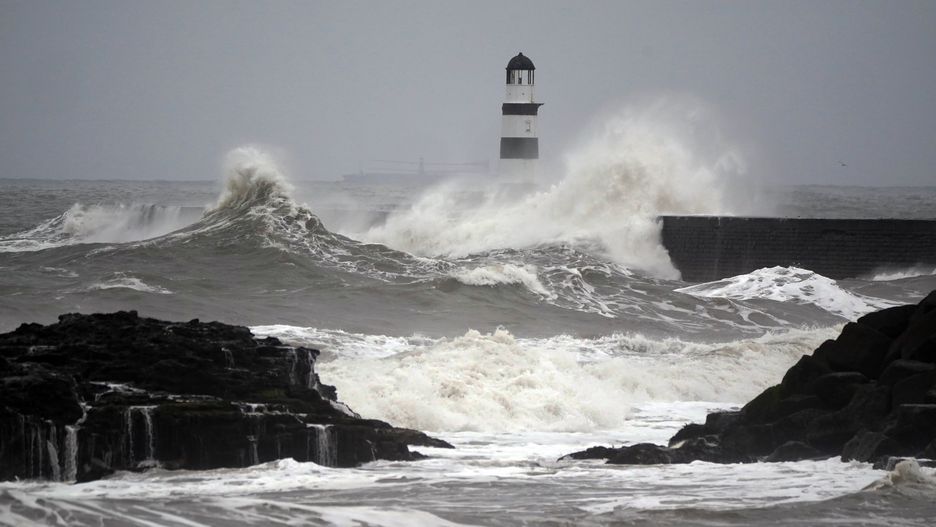Waves crash against the lighthouse in Seaham Harbour, County Durham. Picture date: Saturday April 1, 2023. (Photo by Owen Humphreys/PA Images via Getty Images)