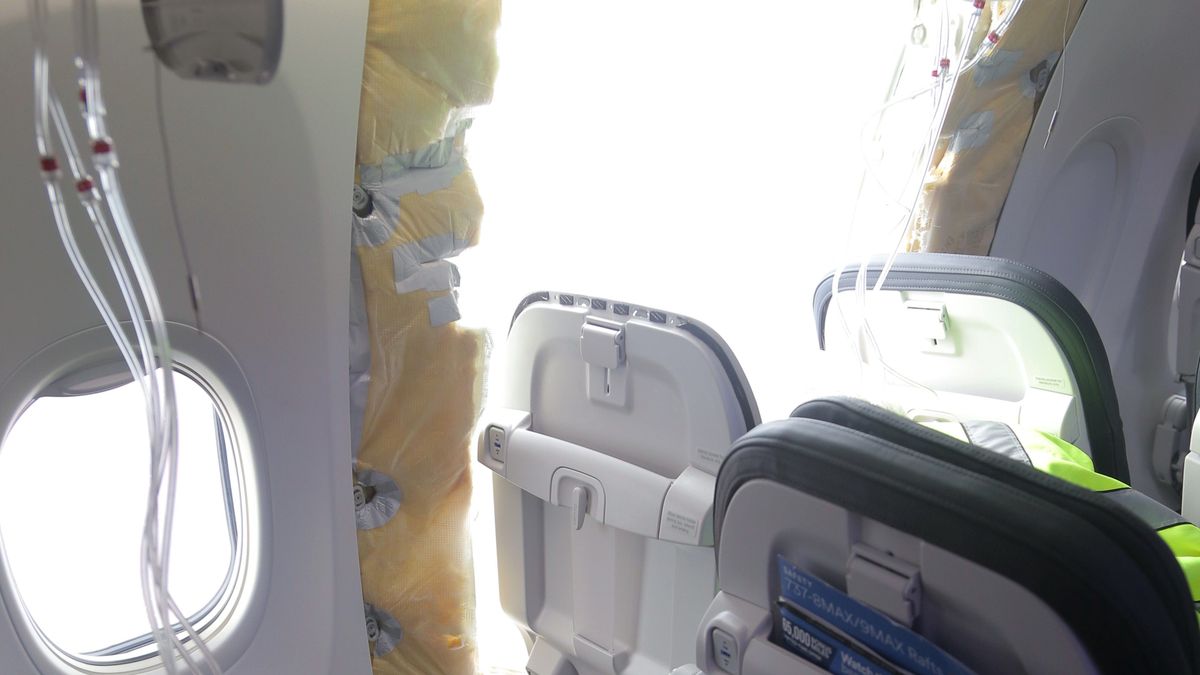 PORTLAND, OREGON - JANUARY 7: In this National Transportation Safety Board (NTSB) handout, an opening is seen in the fuselage of Alaska Airlines Flight 1282 Boeing 737-9 MAX on January 7, 2024 in Portland, Oregon. A door-sized section near the rear of the Boeing 737-9 MAX plane blew off 10 minutes after Alaska Airlines Flight 1282 took off from Portland, Oregon on January 5 on its way to Ontario, California.  (Photo by NTSB via Getty Images)