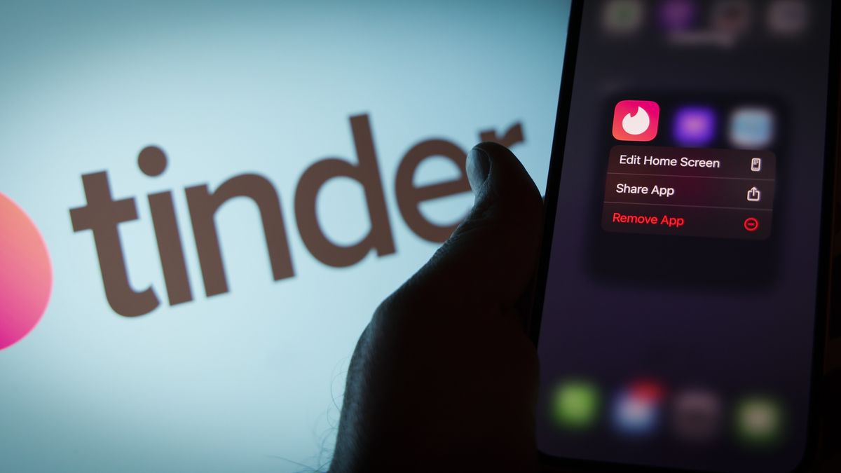 The Tinder app is seen on an iPhone mobile device in this illustration photo in Warsaw, Poland on 12 October, 2022. (Photo by STR/NurPhoto via Getty Images)