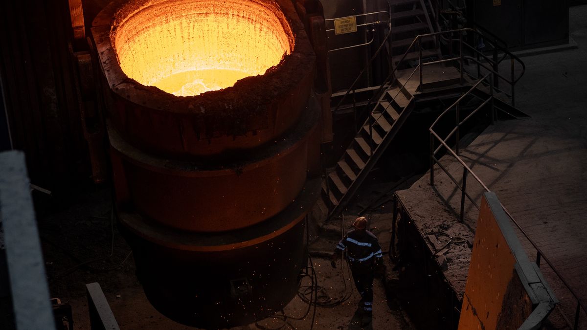 A worker near a slag ladle at the Huta Czestochowa SA Steel Smelter in Czestochowa, Poland, on Tuesday, Aug. 12, 2025. European steelmakers have been grappling in recent years with high energy costs and competition from Asian peers saddled with overcapacity. Photographer: Damian Lemanski/Bloomberg via Getty Images