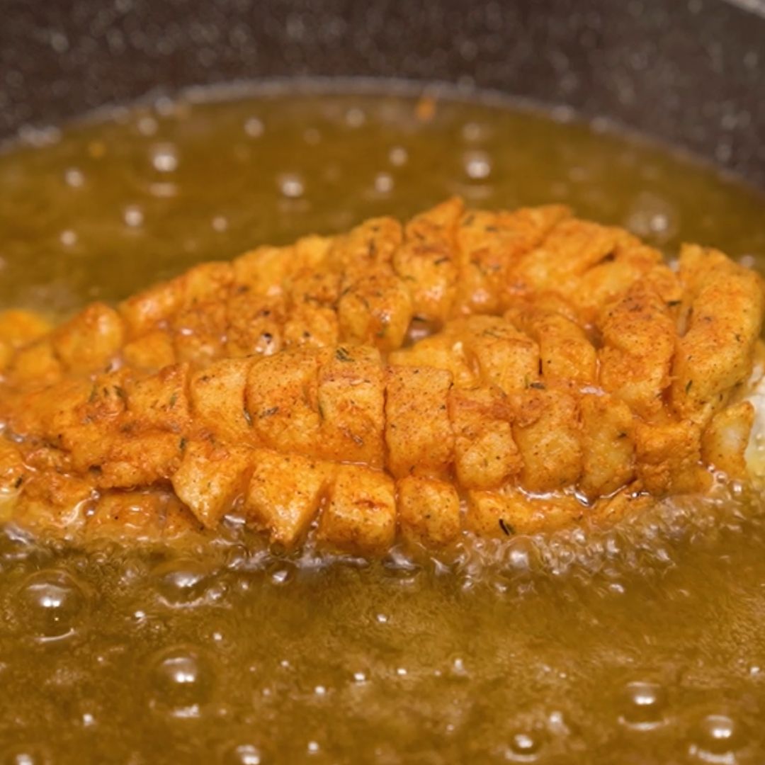 In the end, I fry the fish in heated oil.