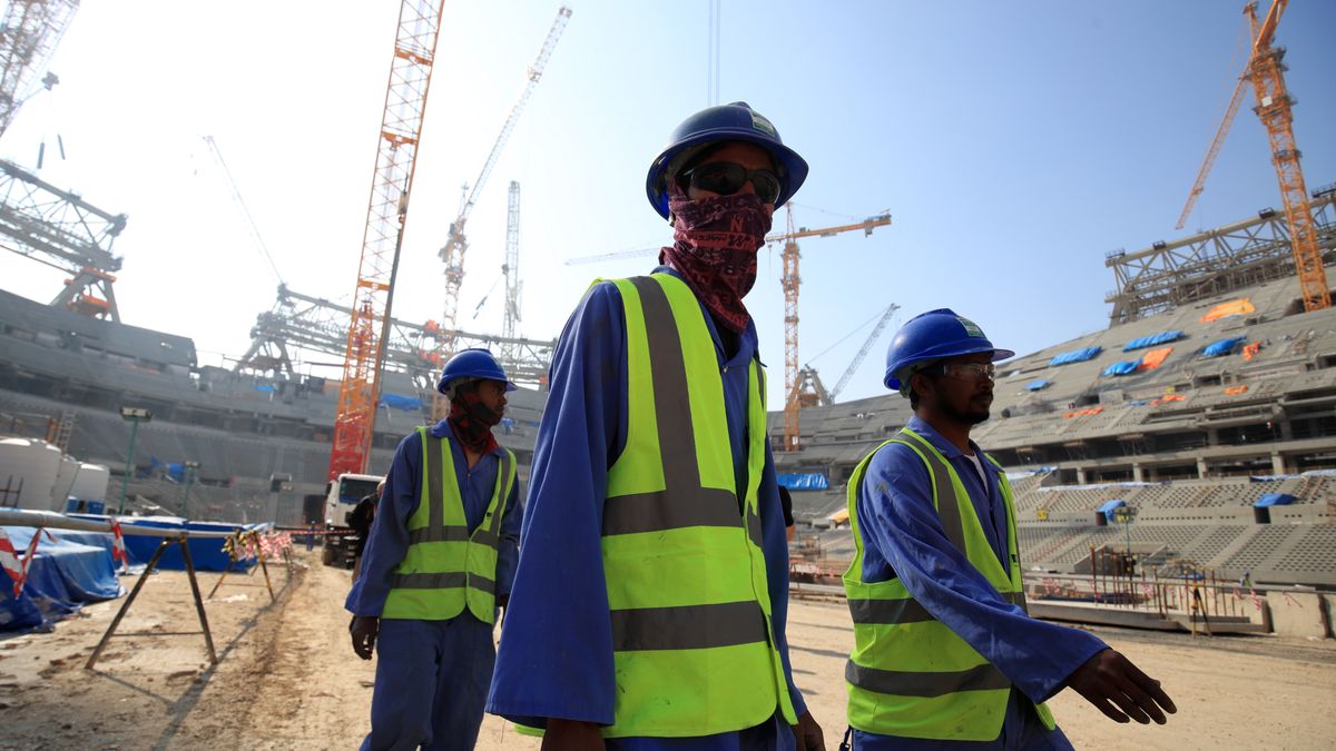 Construction workers at the Lusail Stadium in Lusail, Qatar. (Photo by Adam Davy/PA Images via Getty Images)