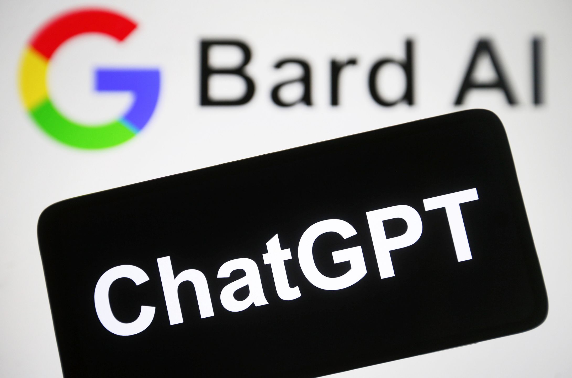 UKRAINE - 2023/02/21: In this photo illustration, a ChatGPT logo is seen on a smartphone and Google Bard AI logo on the background. (Photo Illustration by Pavlo Gonchar/SOPA Images/LightRocket via Getty Images)