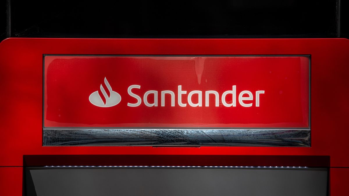 A logo above an automated teller machine (ATM) outside a Banco Santander SA bank branch in Barcelona, Spain, on Monday, Jan. 31, 2022. Santander reports full year earnings on February 2. Photographer: Angel Garcia/Bloomberg via Getty Images