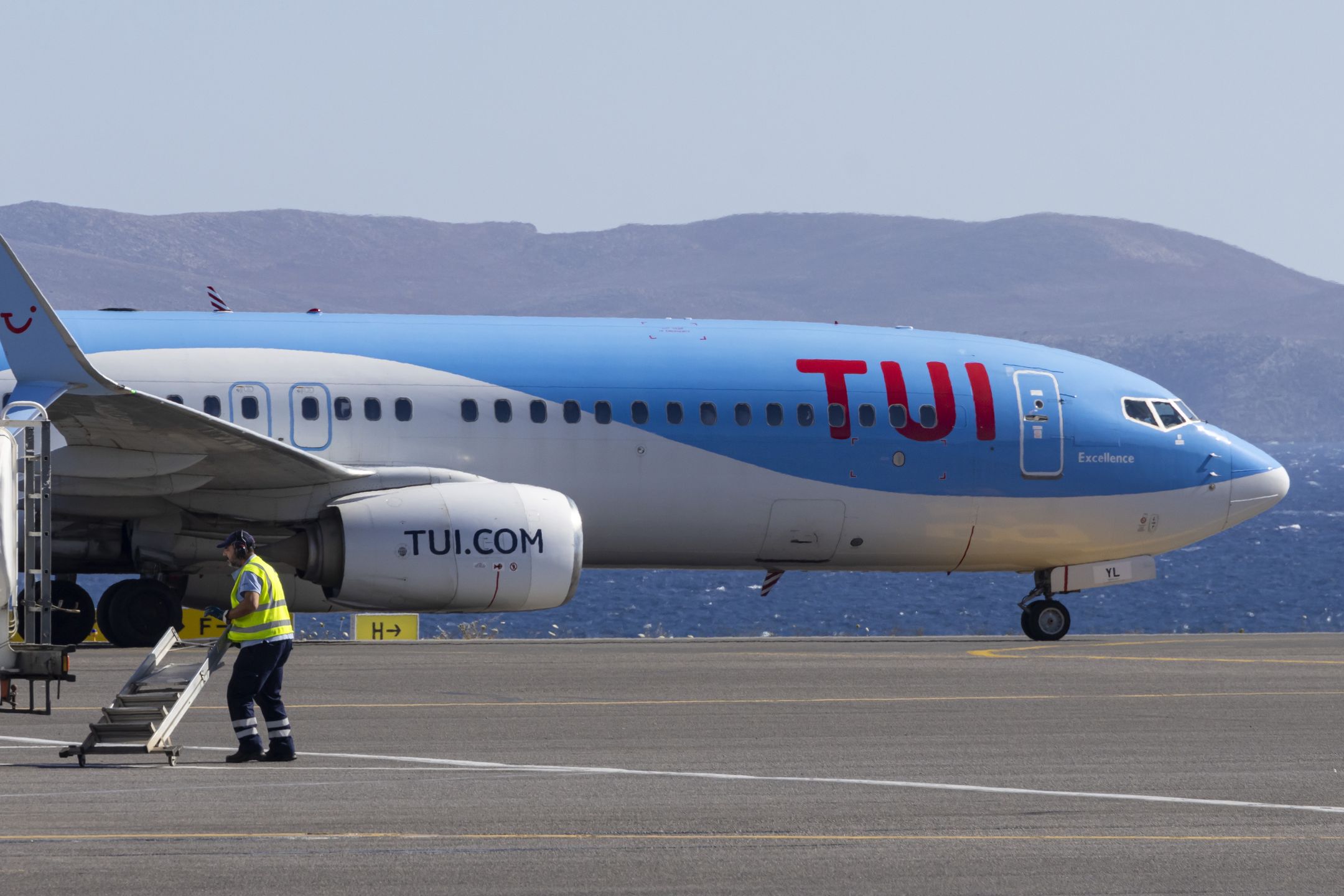 TUI Fly Boeing 737
TUIfly Boeing 737-800 passenger aircraft as seen on the taxiway with the Aegean Sea in the background after landing at Heraklion International Airport Nikos Kazantzakis in Crete Island, Greece. The Boeing B738 airplane has the registration tail number D-ATYL, the name Excellence and is powered by 2x jet engines. TUI fly Deutschland is a German leisure airline with scheduled and charter flights. by the travel and tourism company TUI Group an international tour operator. Heraklion, Greece on May 2024  (Photo by Nicolas Economou/NurPhoto via Getty Images)
NurPhoto
tui, editorial, tui fly deutschland, crete island, wings, holiday, travel destination, tour operator, jet, leisure airline, tui group, aviation, aircraft, tui fly, tuifly, creta, plane, ocean, sum