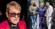Elton John "przyłapany" na zakupach. Gwiazdor miał trudności z poruszaniem się i podpierał się na mężu i ochroniarzu (ZDJĘCIA)