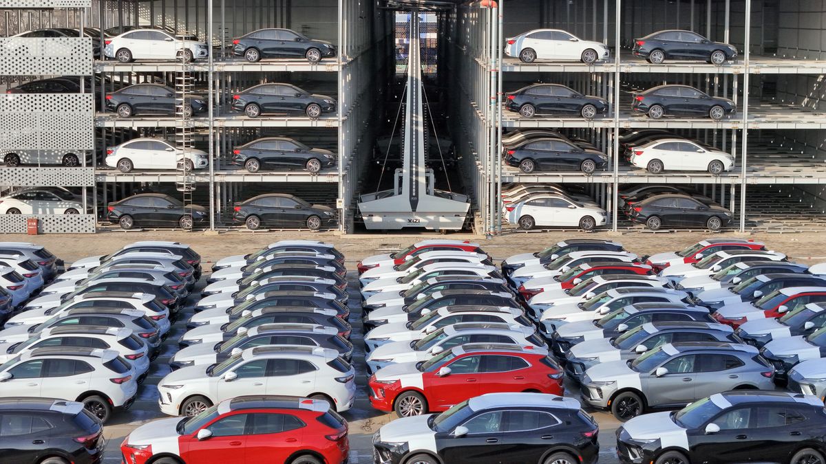 YANTAI, CHINA - JANUARY 13: In an aerial view, China-made cars wait to be loaded onto ships for export at Yantai Port on January 13, 2026 in Yantai, Shandong Province of China. (Photo by Tang Ke/VCG via Getty Images)