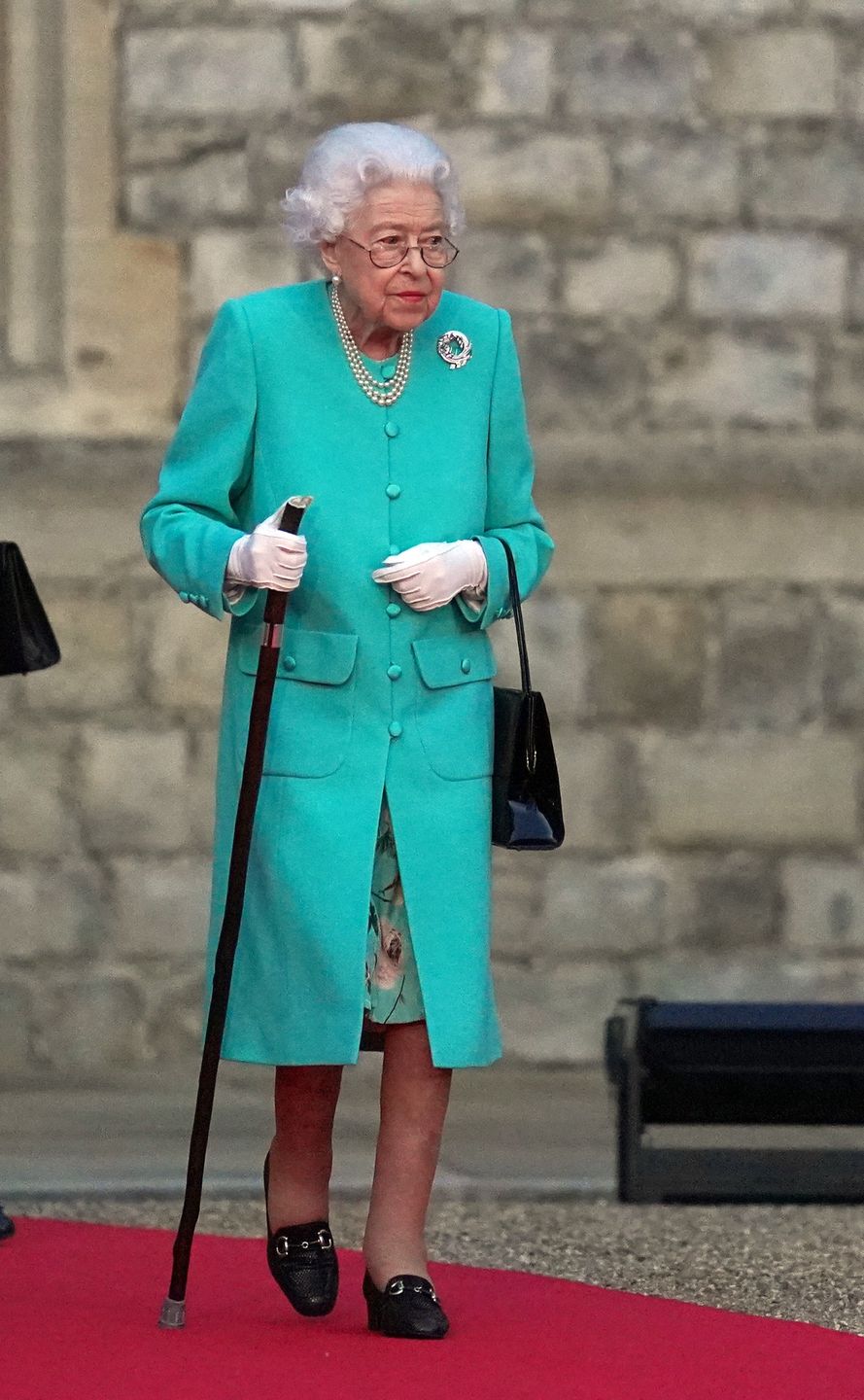 Queen Elizabeth II Platinum Jubilee 2022 - Queen Elizabeth II Lights The Windsor Castle Beacon
WINDSOR, ENGLAND - JUNE 02: Britain's Queen Elizabeth II prepares to touch the Commonwealth Nations Globe to start the lighting of the Principal Beacon outside of Buckingham Palace in London, from the Quadrangle at Windsor Castle in Windsor, west of London, as part of Platinum Jubilee celebrations on June 2, 2022 in Windsor, England. More than 2,800 beacons are lit at Buckingham Palace and across the UK, including atop the four highest peaks, as well as on the Channel Islands, the Isle of Man, and British Overseas Territories. Flaming tributes will be seen in 54 Commonwealth capitals across five continents, from Tonga and Samoa in the South Pacific to Belize in the Caribbean. The Platinum Jubilee of Elizabeth II is being celebrated from June 2 to June 5, 2022, in the UK and Commonwealth to mark the 70th anniversary of the accession of Queen Elizabeth II on 6 February 1952. (Photo by  Steve Parsons-Pool/Getty Images)
Pool
