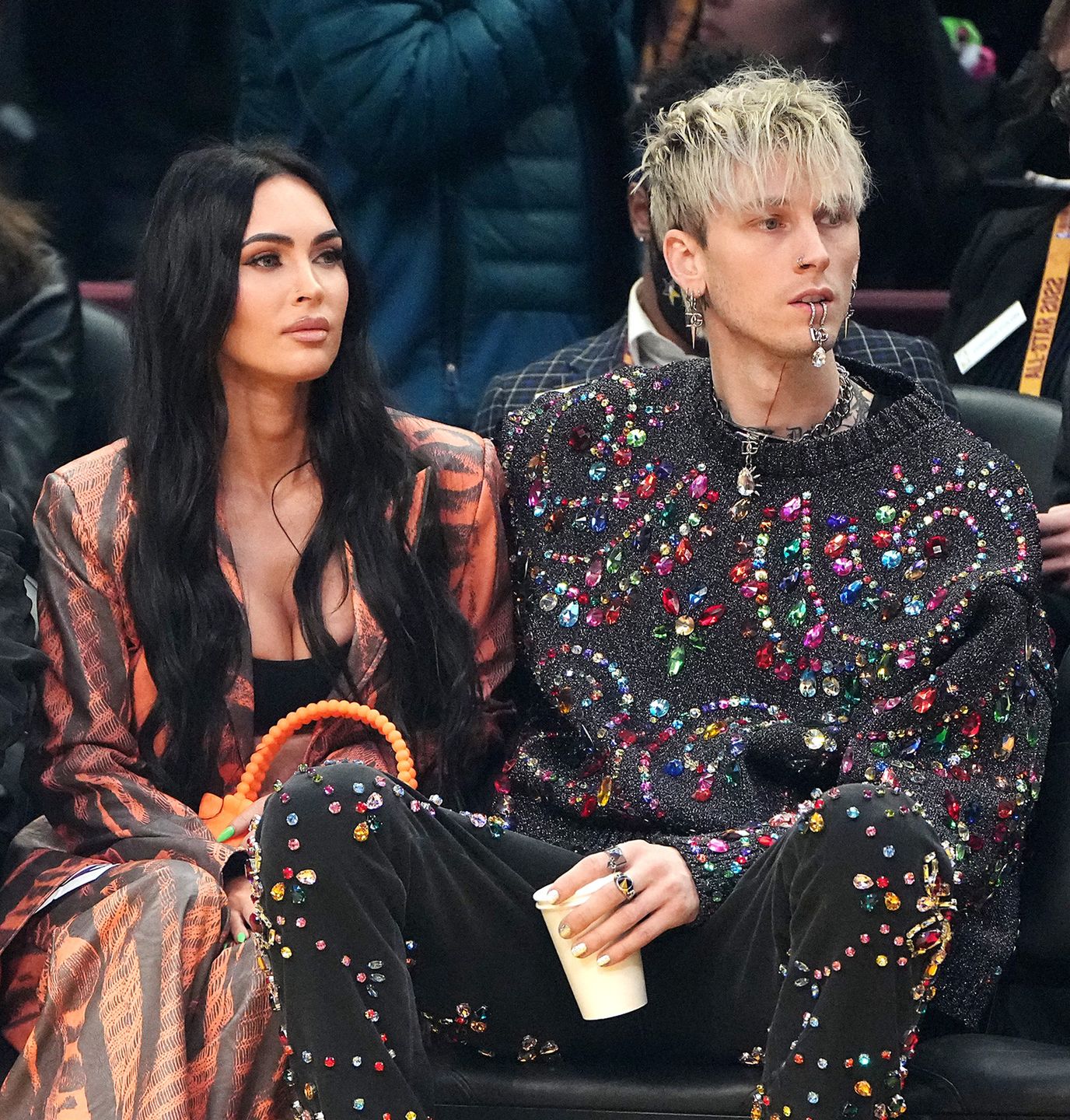 2022 NBA All-Star GameCLEVELAND, OHIO - FEBRUARY 20: (L-R) Megan Fox and Machine Gun Kelly attend the 2022 NBA All-Star Game at Rocket Mortgage Fieldhouse on February 20, 2022 in Cleveland, Ohio. NOTE TO USER: User expressly acknowledges and agrees that, by downloading and or using this photograph, User is consenting to the terms and conditions of the Getty Images License Agreement.  (Photo by Kevin Mazur/Getty Images)Kevin Mazur