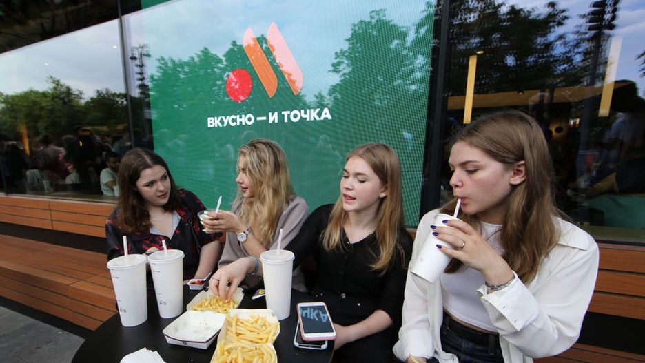 Re-branded McDonalds Venue Open In Moscow
MOSCOW, RUSSIA - JUNE 12: (RUSSIA OUT) People visit a newly opened fast food restaurant in a former McDonald's outlet in Pushkinskaya Square, on June 12, 2022 in Moscow, Russia. The first of the former McDonald's restaurants has reopened under a new brand called "Vkusno i tochka" ("Tasty and point") in Moscow, after the corporation sold its branches in Russia to a local businessman following sanctions after Russia invaded Ukraine. (Photo by Contributor/Getty Images)
Contributor