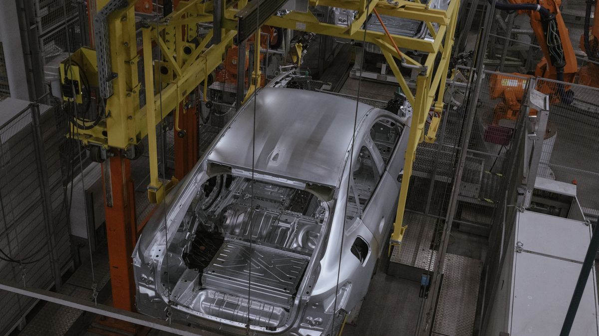 Vehicles move along an assembly line at the BMW manufacturing facility in Munich, Germany, on Wednesday, July 16, 2025. The BMW sport utility vehicle, called the iX3, will be the first of 40 new or updated models that share slick software, high-performance computers and radically different design cues. Photographer: Jana Islinger/Bloomberg via Getty Images