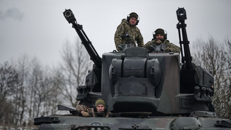UKRAINE - NOVEMBER 23:  Ukranian soldiers on air defense combat duty operate a Flakpanzer Gepard, self-propelled anti-aircraft gun, on November 23, 2023 in the direction of Kyiv, Ukraine. The Gepard (German Flugabwehrkanonenpanzer (also Flakpanzer, FlakPz) Gepard - a tank with an anti-aircraft gun) is a German anti-aircraft self-propelled artillery installation produced by the Krauss-Maffei company in cooperation with other companies. A modified chassis from the Leopard 1 tank and an artillery section based on two 35 mm Oerlikon KDA guns were used. Entered service in Germany, Belgium, and the Netherlands in the second half of the 1970s. The combat baptism took place in 2022 during the Russian-Ukrainian war. It is intended for the protection of armored columns on the march and stationary objects from attacks from helicopters and airplanes at low and ultra-low altitudes day and night under any weather conditions and in conditions of intensive radio-electronic countermeasures by the enemy.  (Photo by Kostya Liberov/ Libkos/Getty Images)