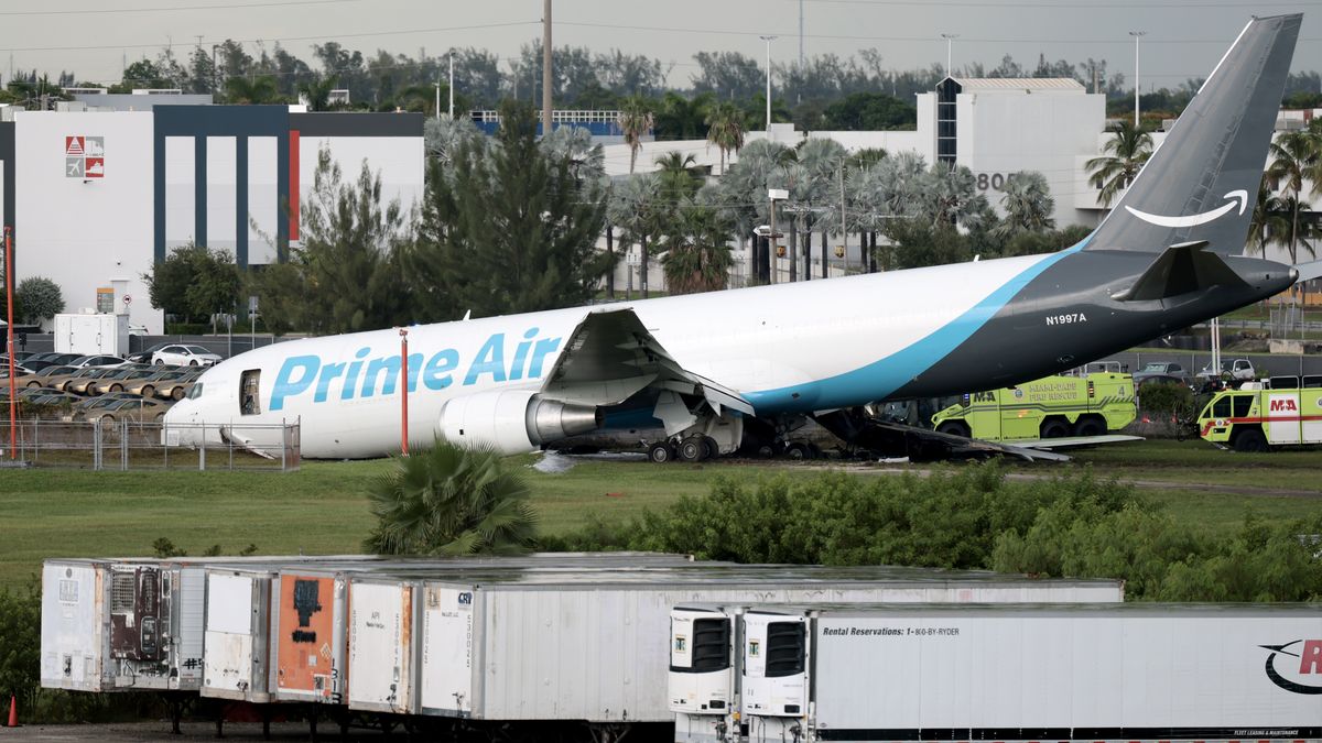 MIAMI, FLORIDA - SEPTEMBER 06:   An Amazon cargo plane is seen after it crashed at Miami International Airport on September 06, 2026 in Miami, Florida. In a statement, the Federal Aviation Administration said Prime Air Flight 7598 overran the runway while landing around 2 p.m. after departing from Luis Muñoz Marín International Airport in San Juan, Puerto Rico, earlier today. (Photo by Joe Raedle/Getty Images)
