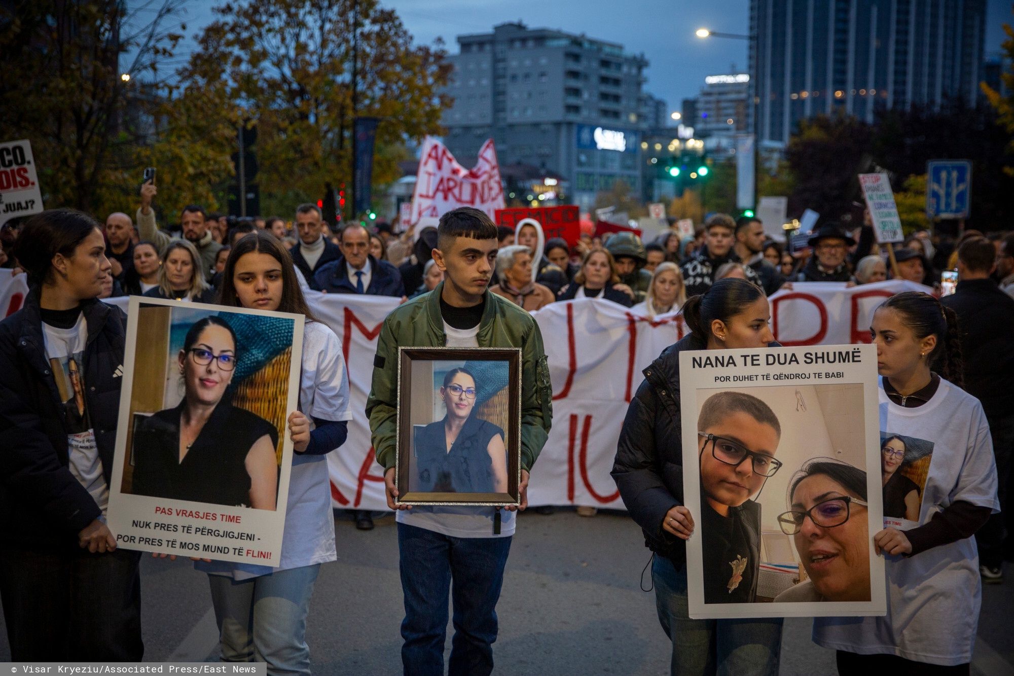 TemporaryFamily members of Arlinda Zekaj hold her picture during a protest in Pristina, Kosovo, as thousands gather to condemn the killing of the Kosovo-American woman, whose death sparked public outrage and renewed calls for accountability over violence against women, on Wednesday, Oct. 28, 2026. (AP Photo/Visar Kryeziu)Visar Kryeziu