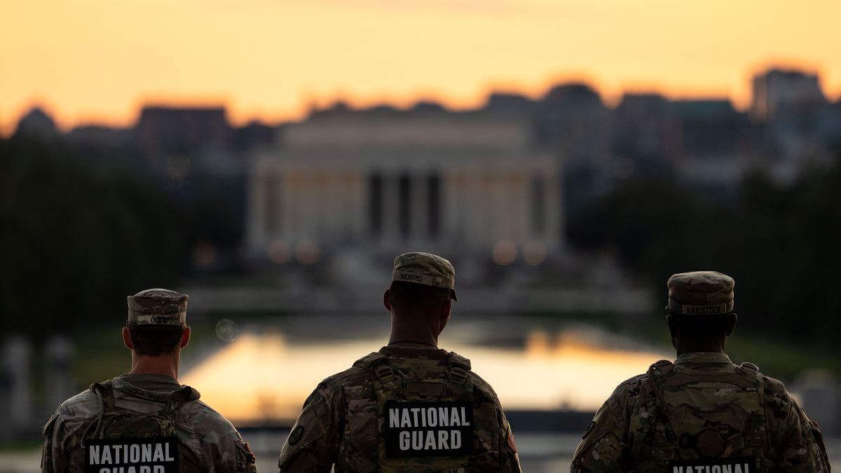 WASHINGTON, DC - SEPTEMBER 2: Members of the National Guard are seen standing near the Washington Monument, on September 02, 2025 in Washington, DC.  Members of the National Guard and Federal Law Enforcement continue to patrol the Nation's Capital, weeks after U.S. President Donald Trump ordered the National Guard and law enforcement to patrol the nation's capital to assist in crime prevention with more than 2,200 National Guard troops have been deployed in Washington, D.C., a mission that experts estimate is costing over $1 million a day when factoring in pay, housing, travel, food, fuel and other logistics, according to comparisons with the 2020 mobilization of 5,000 Guard members that cost more than $2 million daily. (Photo by Kent Nishimura/Getty Images)