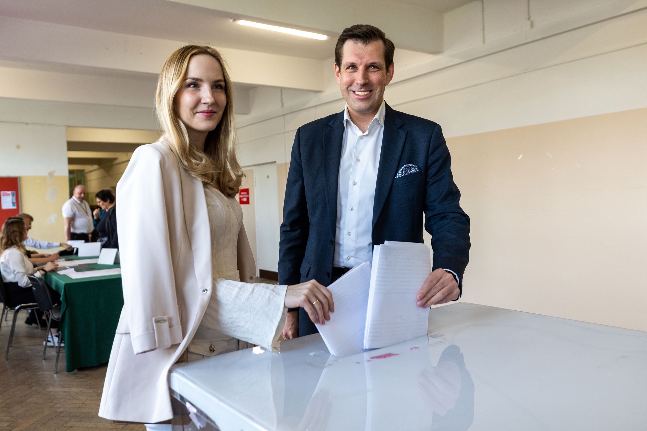 Tobiasz Bochenski, the Law and Justice candidate for mayor of Warsaw, and his wife Elzbieta Bochenska are voting during the local elections in Warsaw, Poland, on April 7, 2024. (Photo by Andrzej Iwanczuk/NurPhoto via Getty Images)