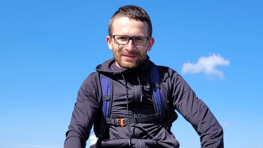 Łukasz Wójcik na szczycie Rysów 