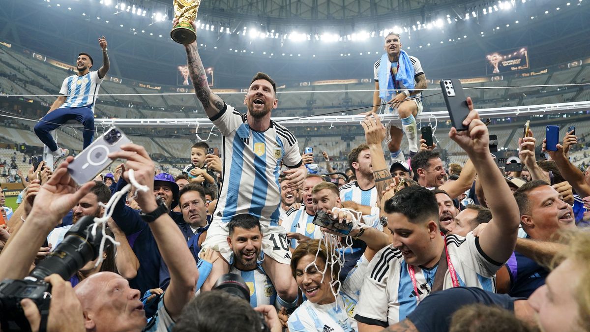 LUSAIL, QATAR - DECEMBER 18: Argentina forward Lionel Messi (10) holds aloft the World Cup trophy after defeating France to win the final match of the FIFA World Cup 2022 between Argentina and France at Lusail Stadium in Lusail, Qatar on December 18, 2022. (Photo by Jabin Botsford/The Washington Post via Getty Images)