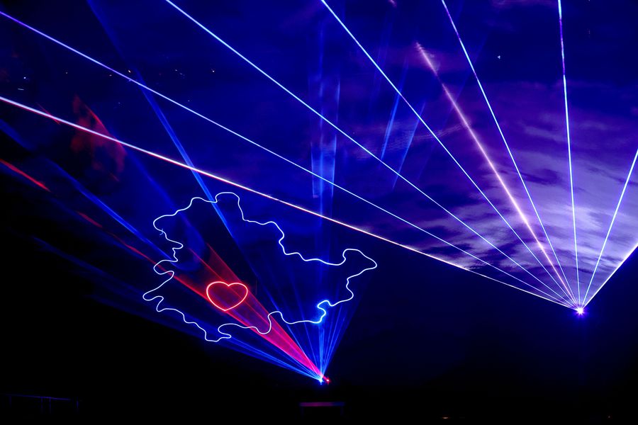 OBERHOF, GERMANY - FEBRUARY 16: Some impression of the laser show at the medal ceremony for the Single Mixed Relay at the IBU World Championships Biathlon on February 16, 2023 in Oberhof, Germany. (Photo by Alexander Hassenstein/Getty Images)