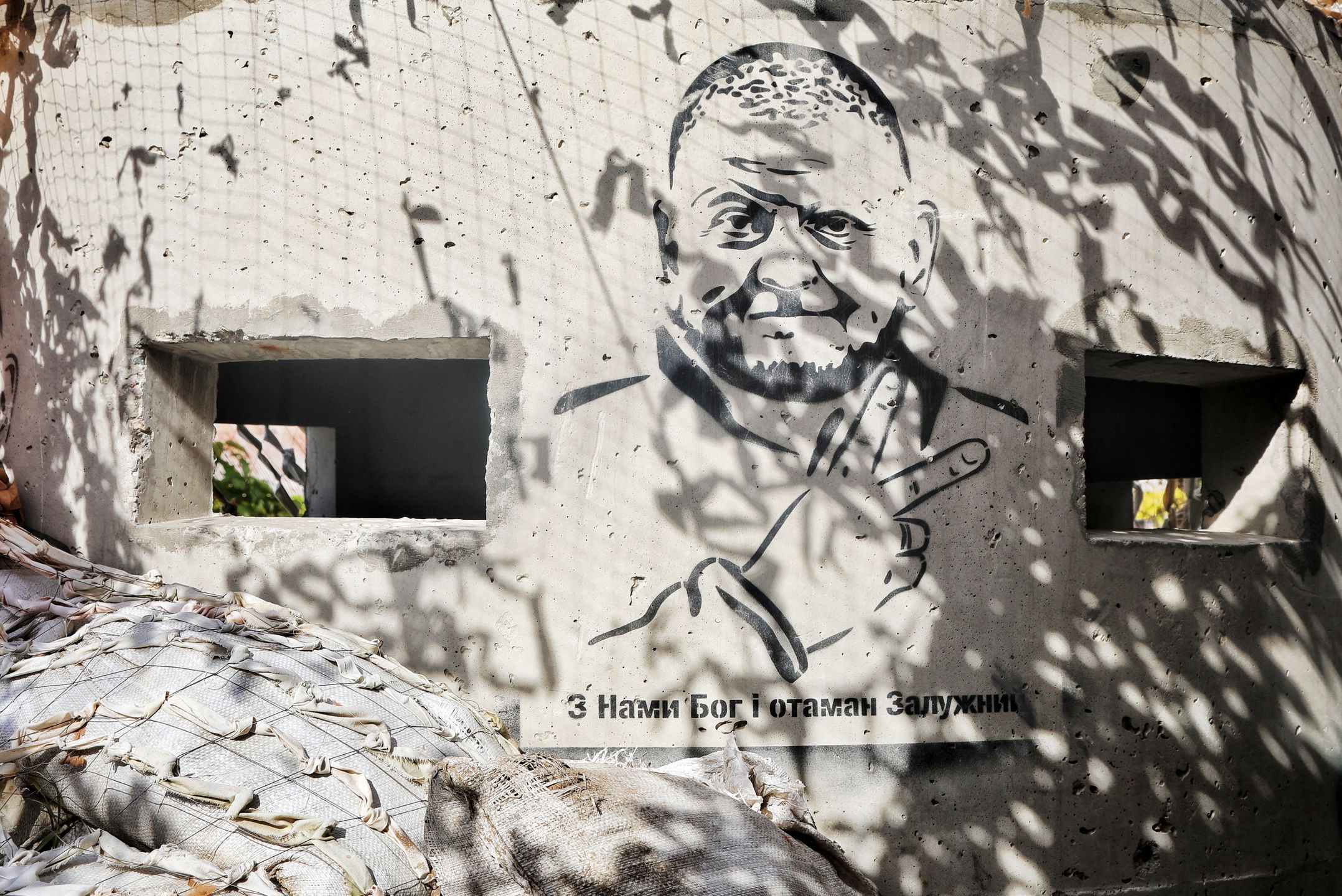 KHERSON, UKRAINE - OCTOBER 24, 2023 - A mural featuring Commander-in-Chief of the Armed Forces of Ukraine, General Valerii Zaluzhnyi is seen on the wall of a concrete pillbox, Kherson, southern Ukraine.  (Photo credit should read Nina Liashonok / Ukrinform/Future Publishing via Getty Images)