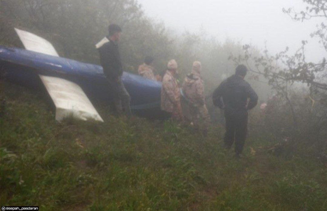 A photo from the crash site where the President of Iran died, showing the tail boom of the helicopter.