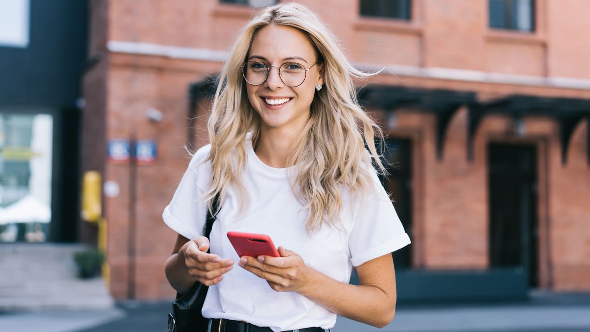 Half length portrait of cheerful caucasian female in trendy wear spending time on street using smartphone, beautiful millennial hipster girl blogger looking at camera in town holding mobile phone
portrait, happy, dialing number, cell network, millennial, media, multimedia, notification, social network, browsing, online, blogging, booking, banking, application, app, content, wireless, 4g internet, communication, connection, technology, modern device, phoning, mobile phone, cellular, cellphone, smartphone, chatting, text messaging, mail, free time, leisure, rest, one person, people, female, woman, hipster girl, 20s, handsome, spectacles, urban setting, street, outdoors