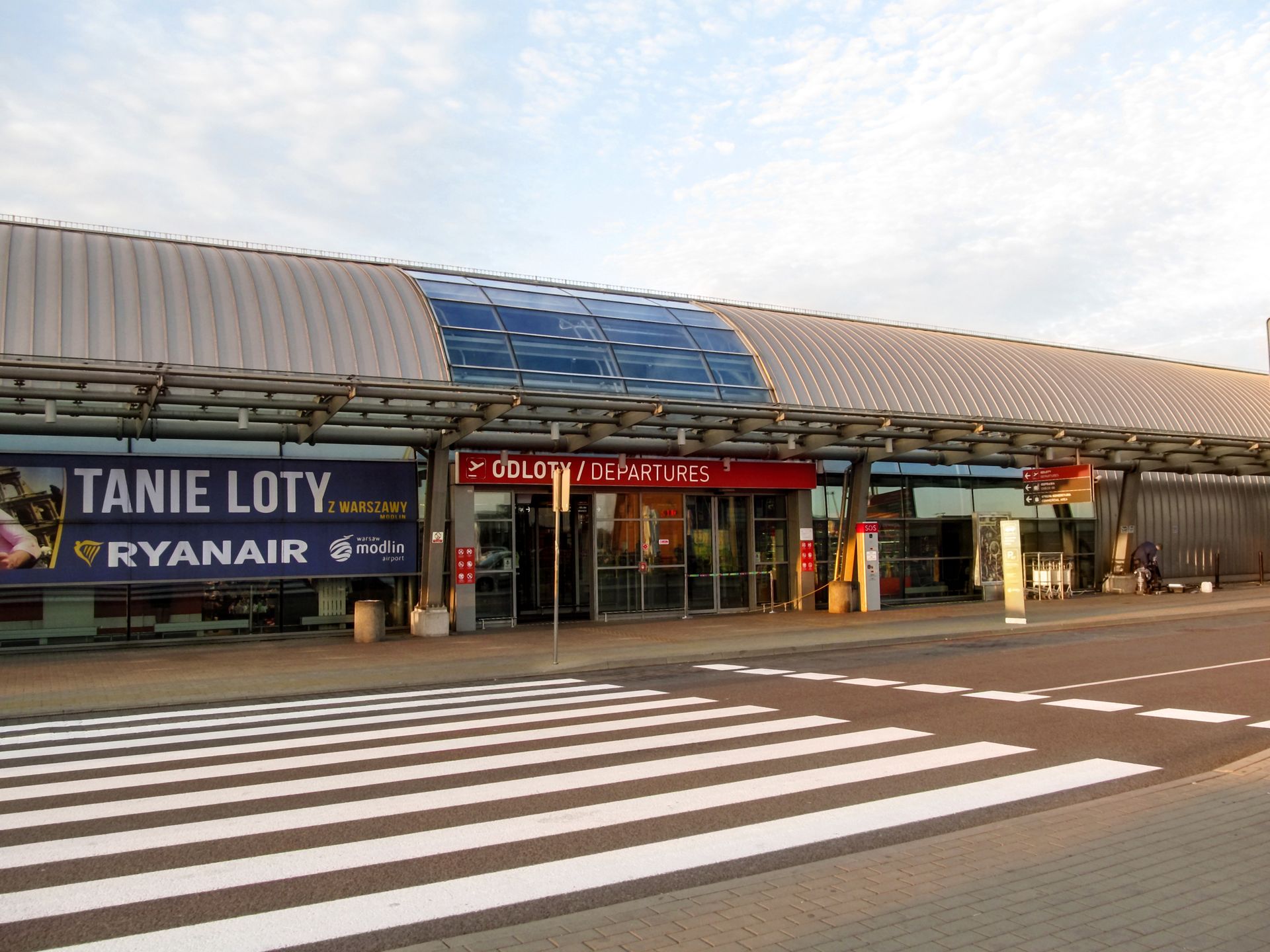 Warsaw, Poland - October 9, 2018: Entrance to the Warsaw Modlin Airport building. Small modern two-story airport passenger terminal, nobody
ioanna_alexa
Warsaw Modlin Airport, Warsaw, Poland, Entrance, Modlin, Airport, building, Small, modern, two-story, passenger, terminal, nobody, polish, cheap airlines, ryanair, travel, koleje mazowieckie, warsaw modlin, flying, modlin airport, transportation, transport, epmo, warszawa modlin, editorial, airplane, no people, aircraft, architecture, main, landscape, urban, outdoor, traffic, day, vacation, street, summer, tourism, city, spring, autumn, landmark, europe, outside, square, public, exterior, transit, warsaw modlin airport, warsaw, poland, entrance, modlin, airport, building, small, modern, two-story, passenger, terminal, nobody, polish, cheap airlines, ryanair, travel, koleje mazowieckie, warsaw modlin, flying, modlin airport, transportation, transport, epmo, warszawa modlin, editorial, airplane, no people, aircraft, architecture, main, landscape, urban, outdoor, traffic, day, vacation, street, summer, tourism, city, spring, autumn, landmark, europe, outside, square, public, exterior, transit