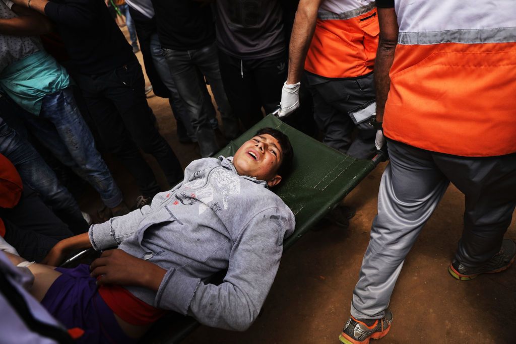 Krwawe starcie w Strefie Gazy. Kilkadziesiąt ofiar, tysiące rannych 11