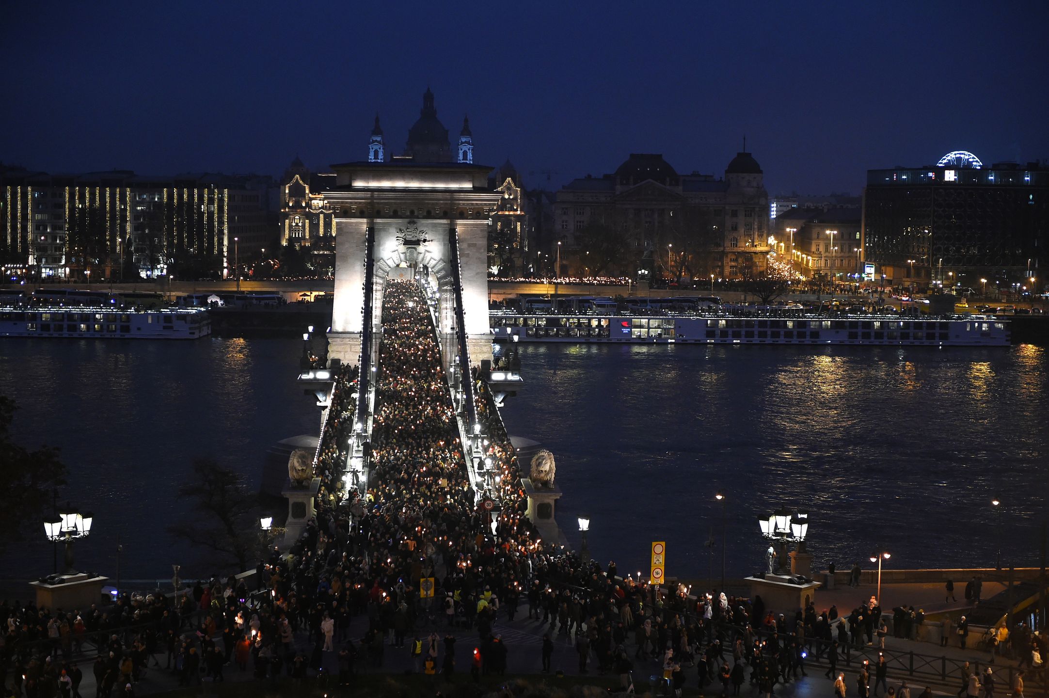 Protestors march in Budapest, Hungary, to the Prime Minister's office on December 13. The protest comes after a report surfaces about the foster care system. (Photo by Balint Szentgallay/NurPhoto via Getty Images)