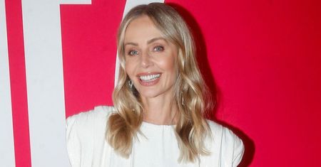 Czarno-biała Agnieszka Woźniak-Starak w kryształowych sandałkach pozuje na premierze filmu "Teściowie 2" (ZDJĘCIA)