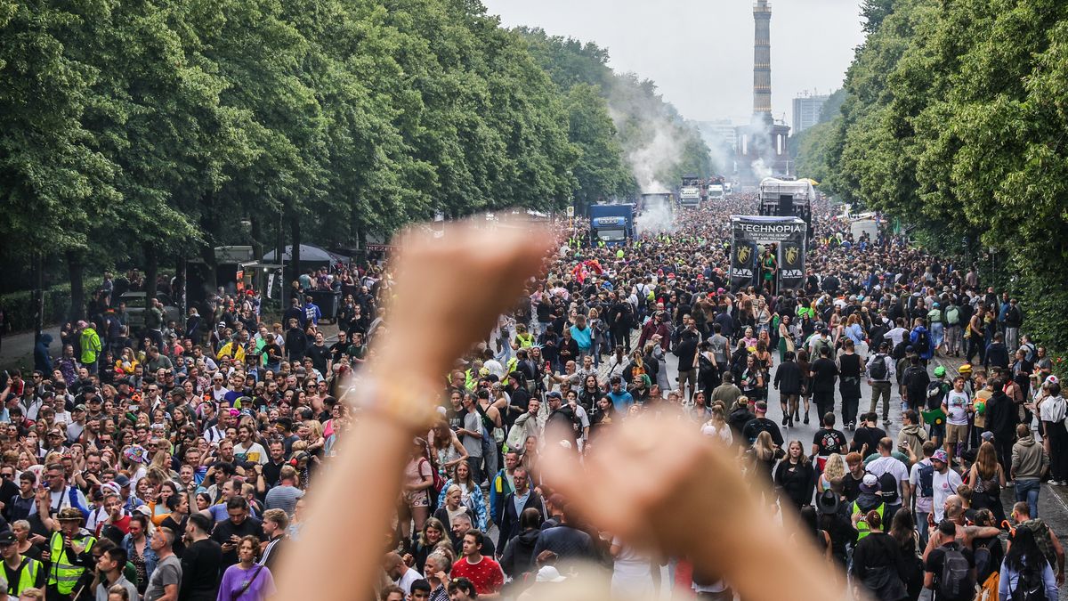 BERLIN, GERMANY - JULY 12: Techno music enthusiasts dance during the annual "Rave the Planet" parade in Tiergarten Park on July 12, 2025 in Berlin, Germany. This year's parade, which is taking pace under the motto: "Our Future Is Now," is also meant as a political statement for unity, diversity and a sustainable future. (Photo by Omer Messinger/Getty Images)