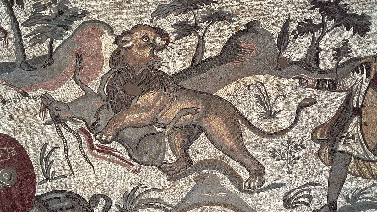 A deer being attacked by wild animals
ITALY - CIRCA 2002:  A deer being attacked by wild animals, detail from the Great Hunt mosaic in Villa Romana del Casale (UNESCO World Heritage, 1997), Piazza Armerina, Sicily. Roman Civilization, 4th Century.  (Photo by DeAgostini/Getty Images)
DEA PICTURE LIBRARY
4th century, ancient, ancient rome, animal representation, animal themes, animals hunting, art and craft, deer, horizontal, italy, killing, lion, mosaic, no people, sicily, villa romana del casale, wildlife