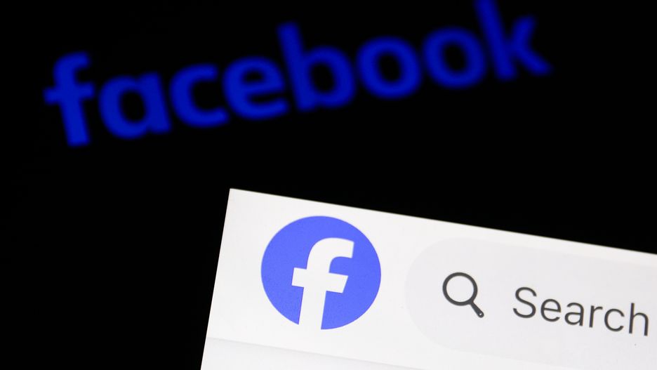 Facebook logo displayed on a phone screen and Facebook website displayed on a laptop screen are seen in this illustration photo taken in Krakow, Poland on February 4, 2024. (Photo by Jakub Porzycki/NurPhoto via Getty Images)