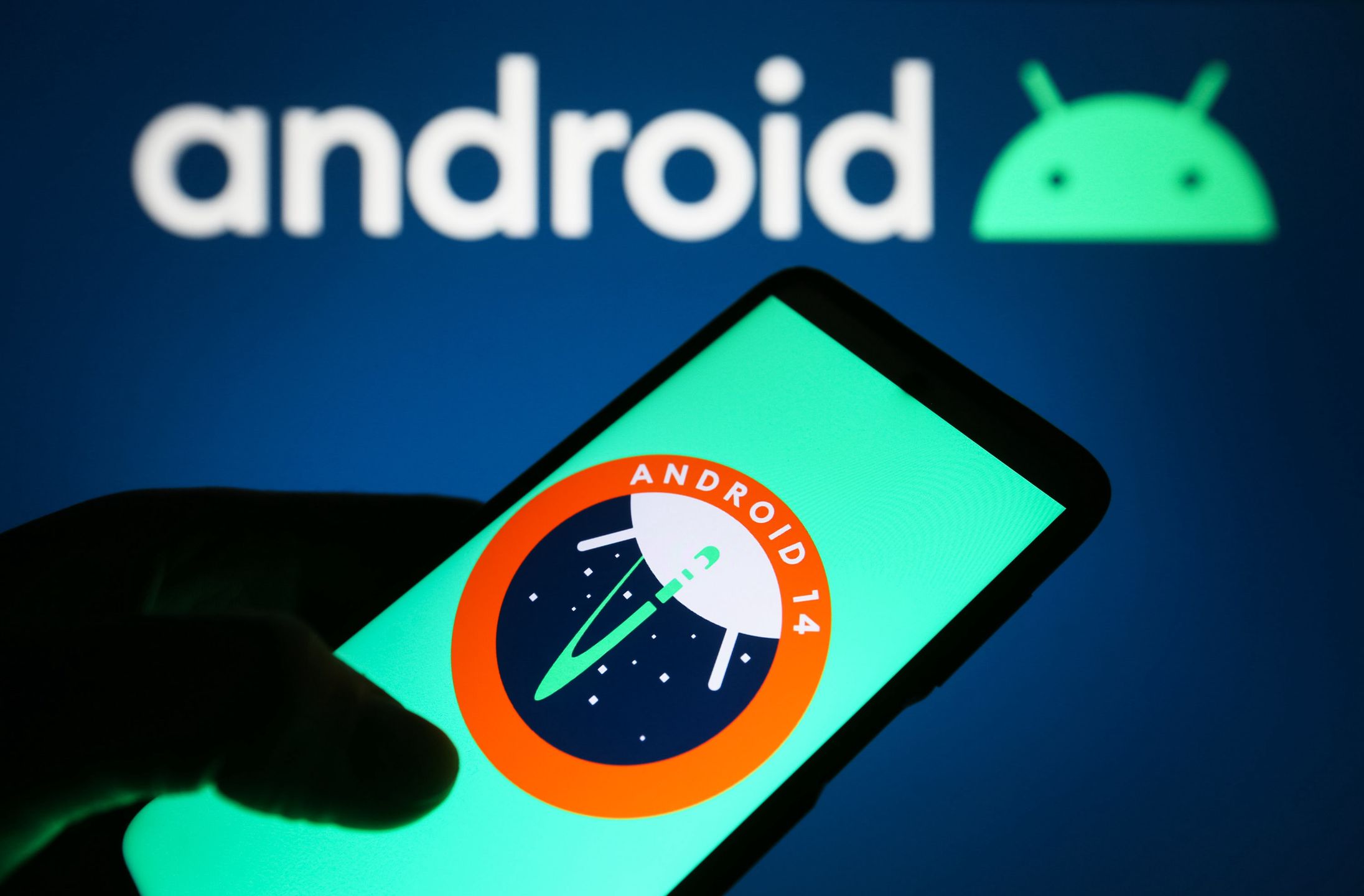 UKRAINE - 2023/03/15: In this photo illustration, Android 14 logo of a mobile operating system is seen on a smartphone and Android logo on a pc screen. (Photo Illustration by Pavlo Gonchar/SOPA Images/LightRocket via Getty Images)