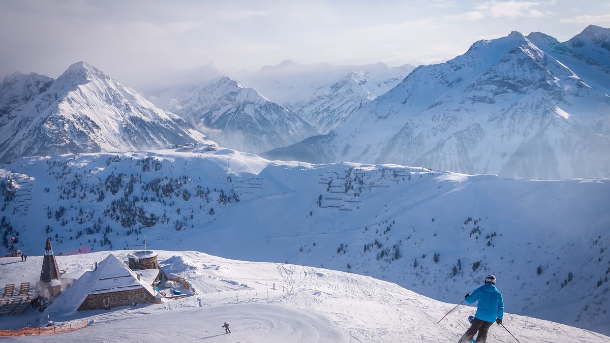 Skier in Zillertal Arena ski resort. Tyrol Mayrhofen in Austria in winter AlpsSkier in Zillertal Arena ski resort. Tyrol Mayrhofen in Austria in winter Alps