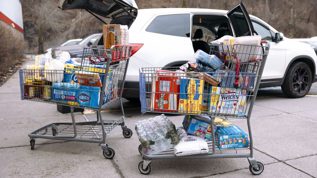 Shopping carts outside a BJ's Wholesale Club location in Rotterdam, New York, US, on Monday, March 4, 2024. BJ's Wholesale Club Holdings Inc. is scheduled to release earnings figures on March 7. Photographer: Angus Mordant/Bloomberg via Getty Images