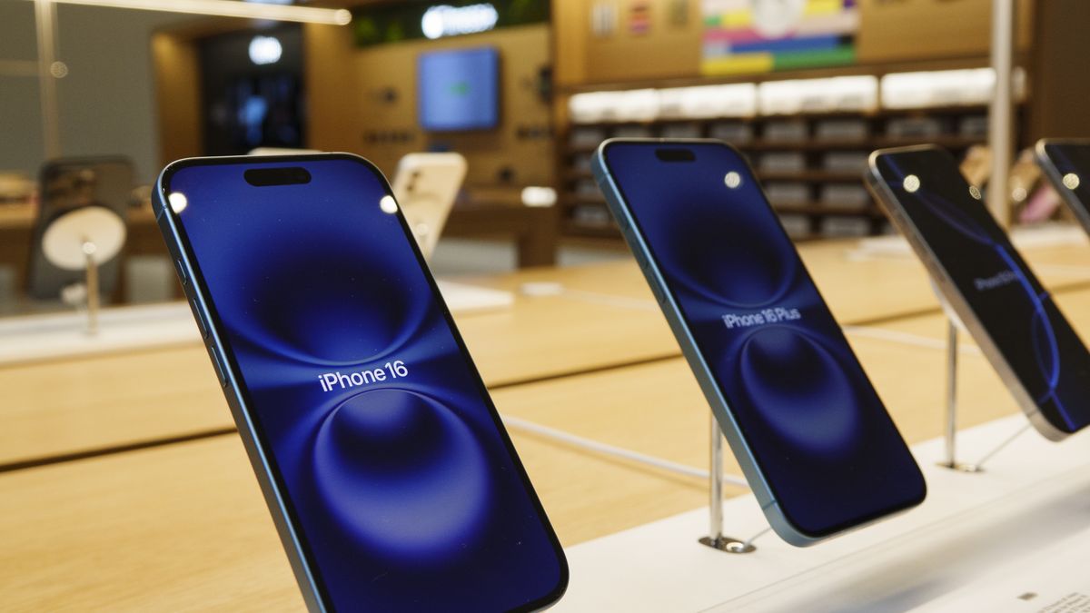 WASHINGTON, DC - MAY 30: An iPhone 16 is displayed inside of the Apple Carnegie Library store on May 30, 2025 in Washington, DC. (Photo by Kevin Carter/Getty Images)