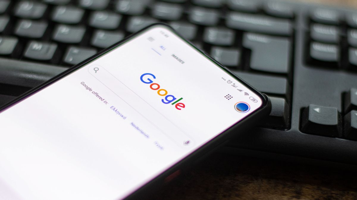 Google closeup logo displayed on a phone screen, smartphone on a keyboard is seen in this multiple exposure illustration, the company's symbol is globally recognized. Google, LLC is an American tech giant, a multinational technology company that specializes in Internet-related services and products, which include online advertising technologies, a search engine, cloud computing, software, and hardware. It is considered one of the Big Four technology companies in the U.S. . Amsterdam, the Netherlands on October 22, 2020 (Photo by Nicolas Economou/NurPhoto via Getty Images)