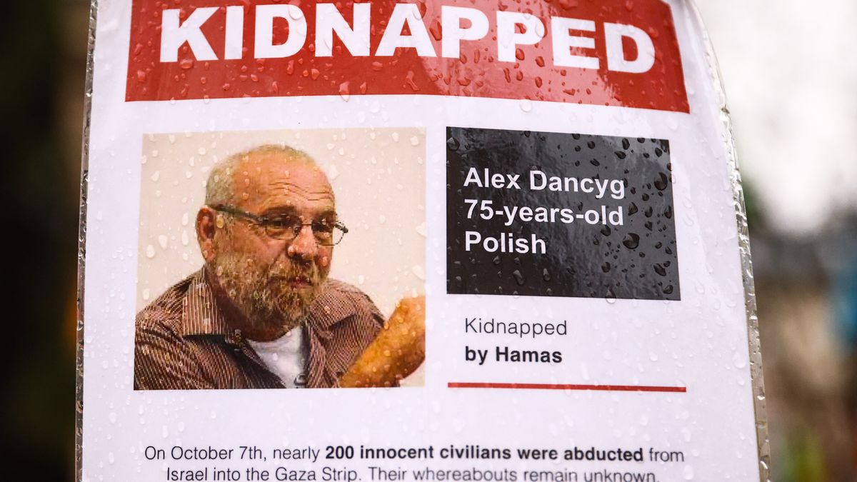 An images of Alex Dancyg, Polish hostage kidnapped by Hamas is hanging on a gate of  Jewish Community Centre in Krakow, Poland on January 1st, 2024. Around 240 people were taken captive by Hamas during the terror attack on Israel on October 7th, with 105 prisoners later being released  during a six-day ceasefire at the end of November.
 (Photo by Beata Zawrzel/NurPhoto via Getty Images)