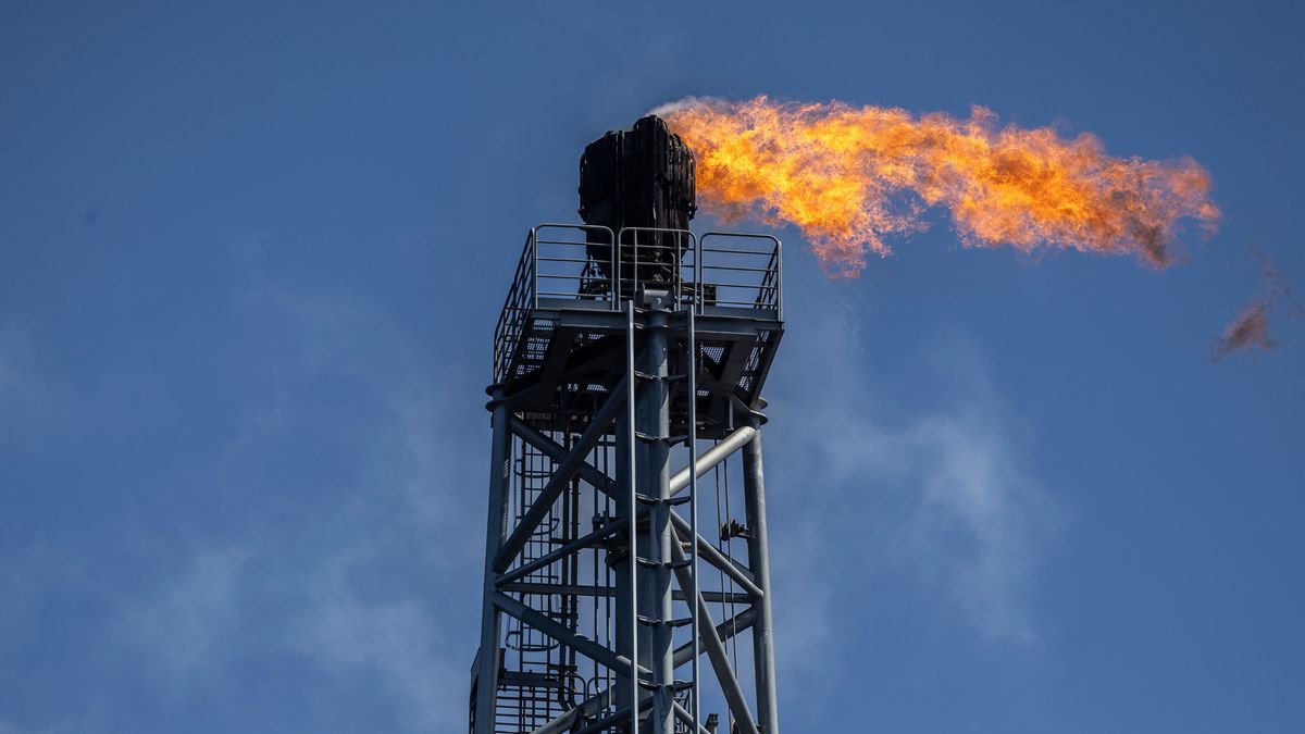 A gas flare burns on the Almirante Tamandare floating production and storage vessel, operated by SBM Offshore NV for Petroleo Brasileiro SA, in the Buzios field off the coast of Rio de Janeiro, Brazil, on Friday, Oct. 24, 2025. Brazil's state oil company is accelerating production from the Buzios field as crude prices hover near a five-year low and the global market braces for glut. Photographer: Dado Galdieri/Bloomberg via Getty Images