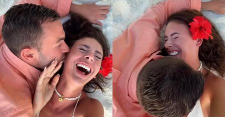 Ukochany całuje leżącą na plaży Klaudię Halejcio po uszach i dekolcie. Romantycznie?