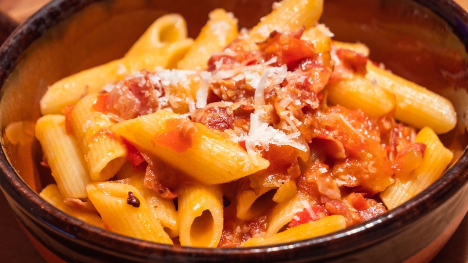 Penne all Arrabiata Pasta or Noodle Dish with Parmesan Cheese on a Rustic Tableall, all'arrabbiata, allarrabbiata, arabiata, arabiatta, arrabbiata, arrabbiata sauce, arrabiata, arrabiatta, bacon, bowl, cheese, chili, chilli, cuisine, delicious, dinner, dish, food, fork, fresh, homemade, hot, italian, italy, knife, lazio, lunch, meal, noodle, parmesan, pasta, penne, pepper, plate, red, rigate, roman, rustic, sauce, serving, spicy, sugo, sugo all'arrabbiata, table, tasty, tomato, traditional, wood