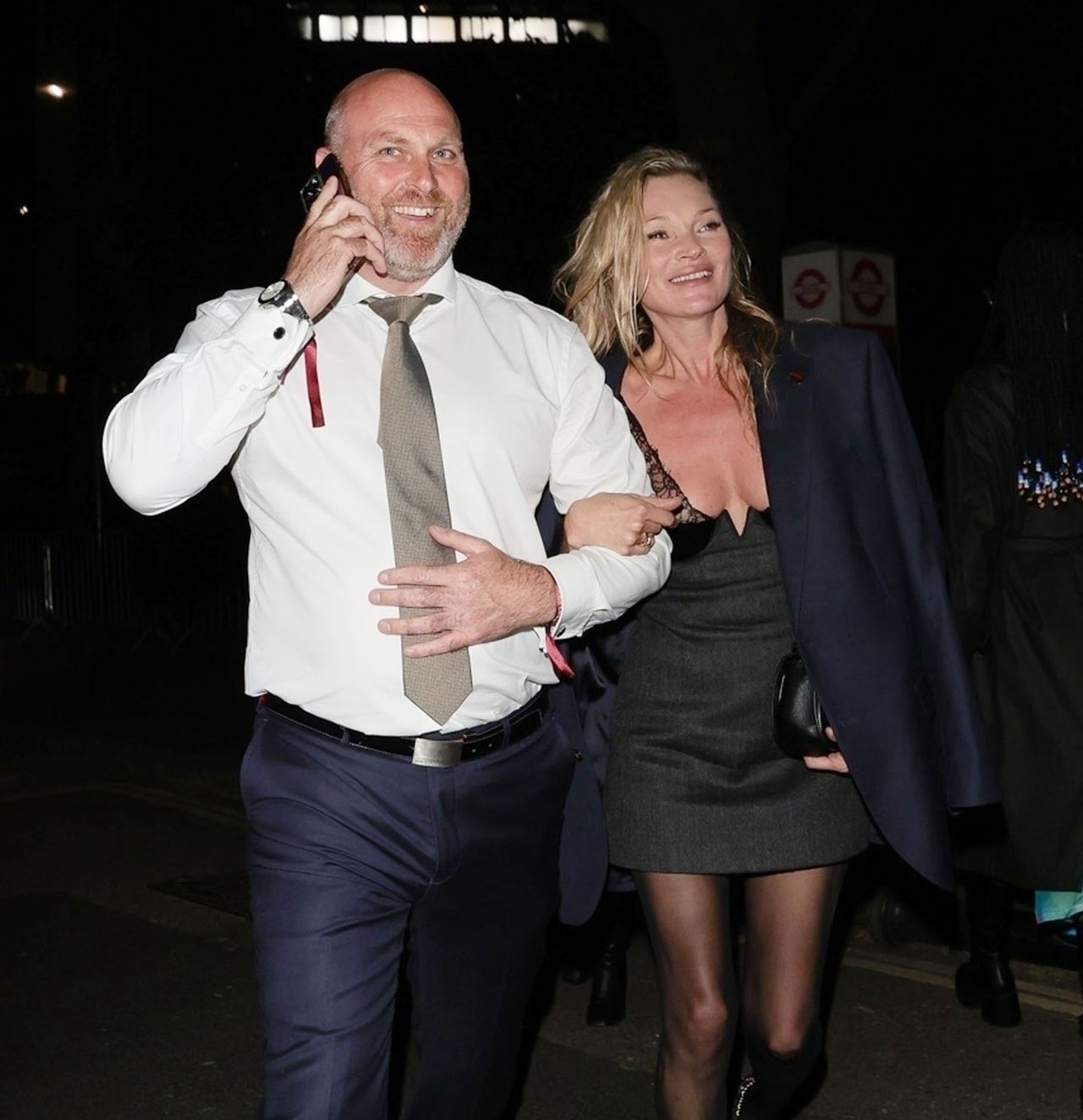 Laughing Kate Moss runs out of the Gucci after party.