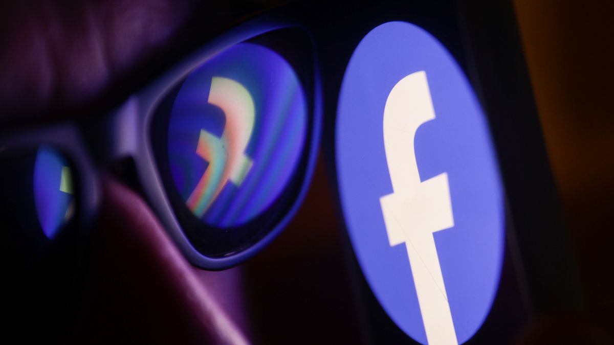 Facebook logo reflected on sunglasses and displayed on a phone screen is seen in this illustration photo taken in Poland on June 27, 2024. (Photo by Jakub Porzycki/NurPhoto via Getty Images)