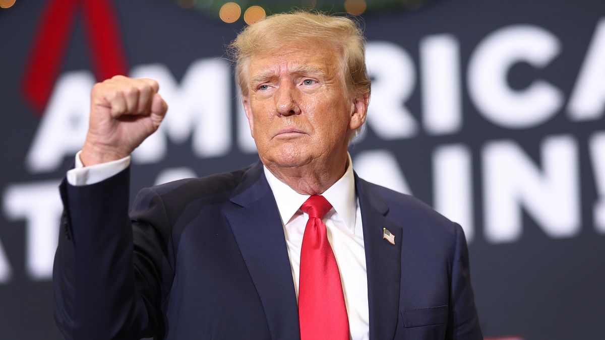 WATERLOO, IOWA - DECEMBER 19: Republican presidential candidate and former U.S. President Donald Trump gestures as he wraps up a campaign event on December 19, 2023 in Waterloo, Iowa. Iowa Republicans will be the first to select their party's nomination for the 2024 presidential race, when they go to caucus on January 15, 2024. (Photo by Scott Olson/Getty Images)