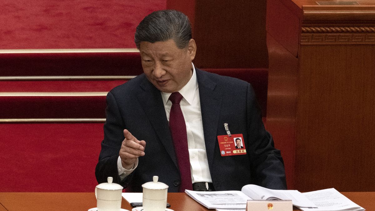 BEIJING, CHINA - MARCH 5: Chinese President Xi Jinping gestures at the opening session of the National People's Congress, or NPC, at the Great Hall of the People on March 5, 2025 in Beijing, China. China's annual political gathering known as the Two Sessions will convene leaders and lawmakers to set the government's agenda for domestic economic and social development for the year. (Photo by Kevin Frayer/Getty Images)