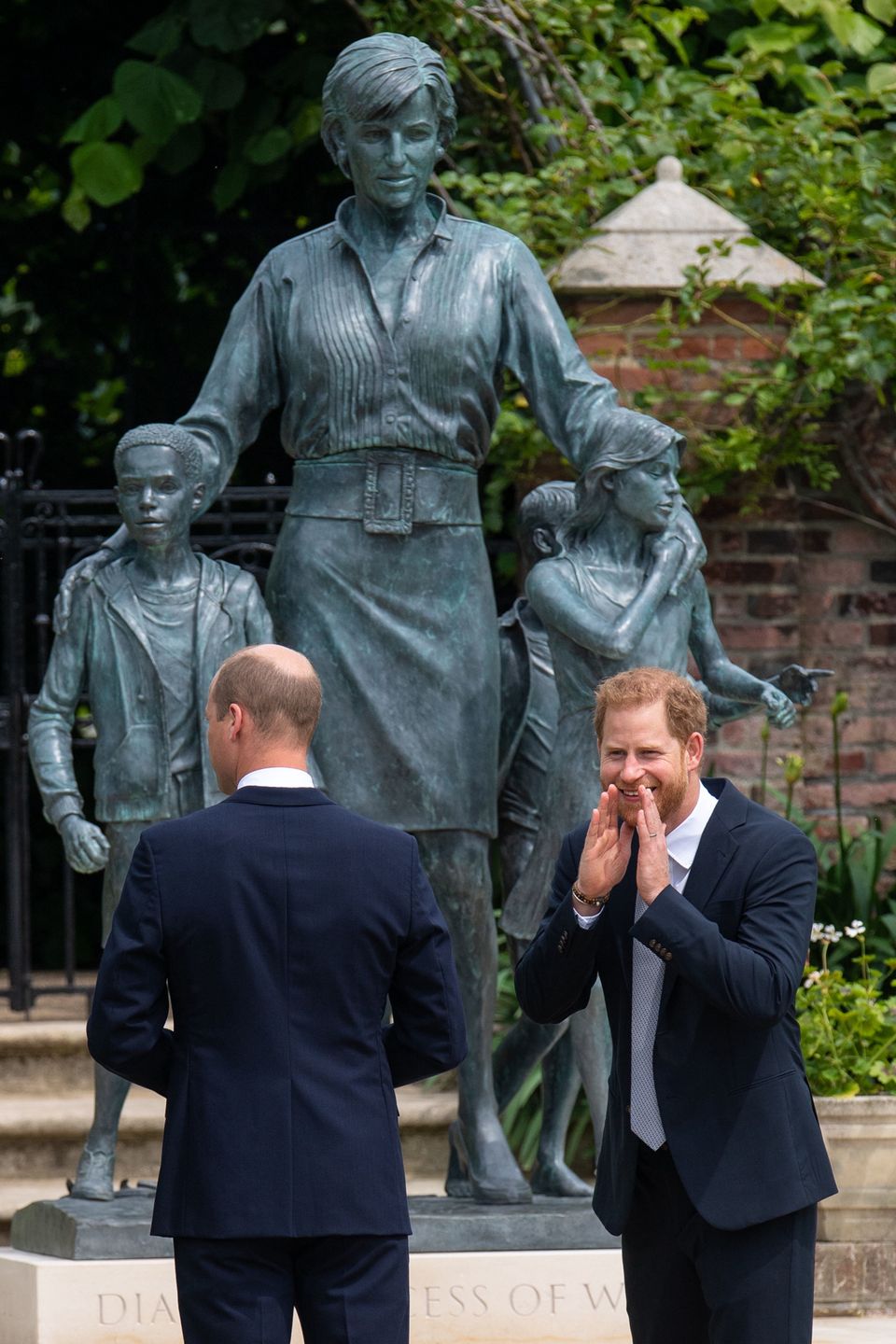 Diana, Princess Of Wales Statue Unveiling At Kensington PalaceLONDON, ENGLAND - JULY 01: Prince William, Duke of Cambridge (left) and Prince Harry, Duke of Sussex unveil a statue they commissioned of their mother Diana, Princess of Wales, in the Sunken Garden at Kensington Palace, on what would have been her 60th birthday on July 1, 2021 in London, England. Today would have been the 60th birthday of Princess Diana, who died in 1997. At a ceremony here today, her sons Prince William and Prince Harry, the Duke of Cambridge and the Duke of Sussex respectively, will unveil a statue in her memory. (Photo by Dominic Lipinski - WPA Pool/Getty Images)WPA Pool