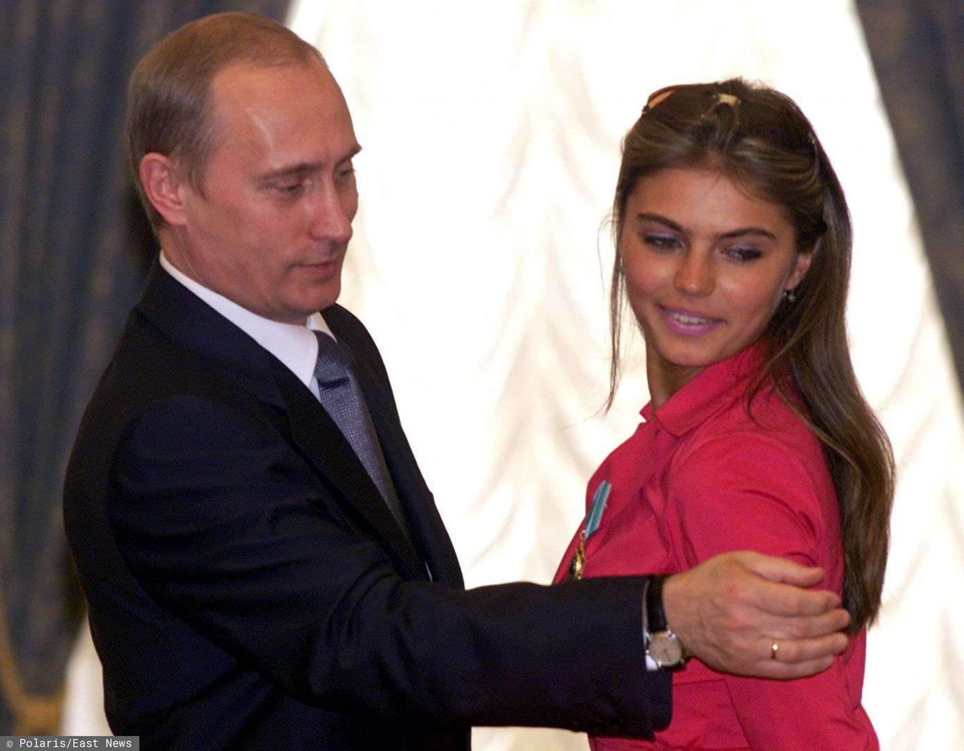 Putin
Russian President Vladimir Putin, left, hands over a state award to olympic games and world champinships winner, rhytmic gymnast Alina Kabaeva. (Polaris)