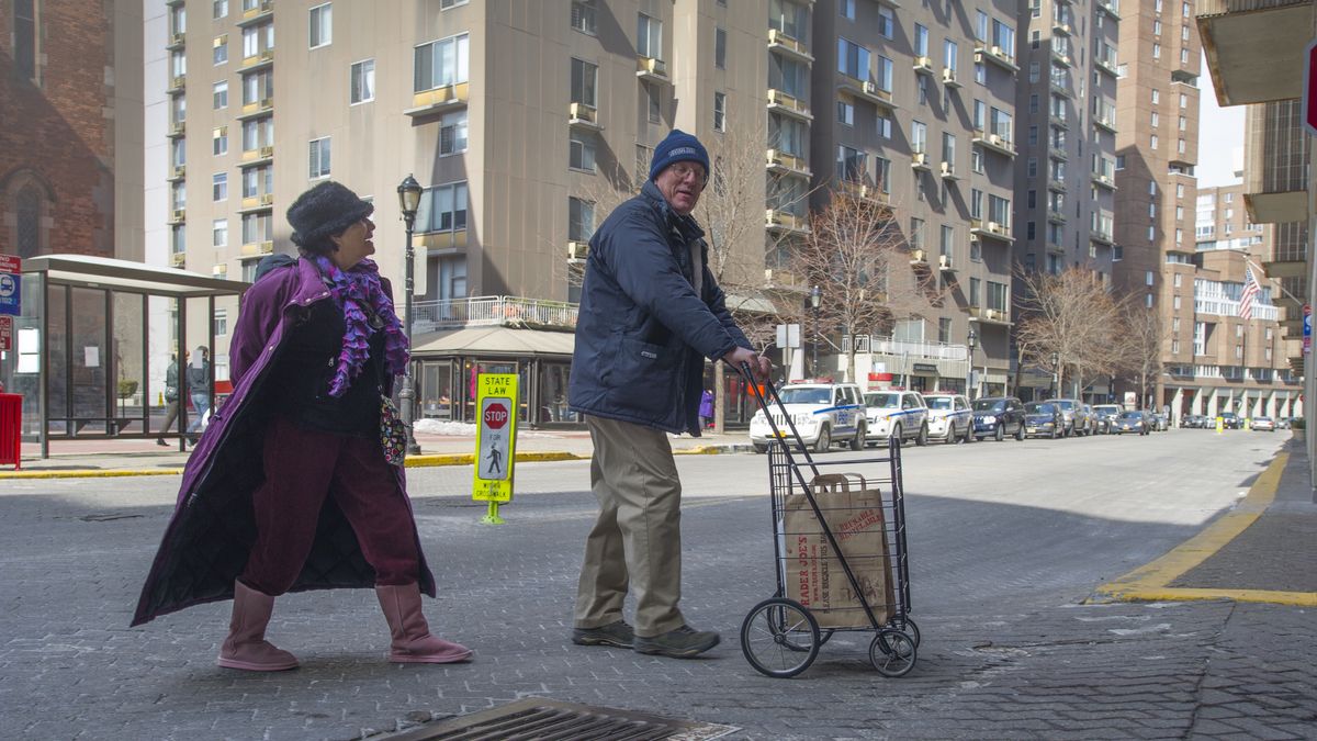 Man And Woman With Shopping Cart Crossing Street
Man And Woman With Shopping Cart Crossing Street. (Photo by: Education Images/Universal Images Group via Getty Images)
Education Images
Accompany, Chatting, Cold Weather, Crossing Street, Errand, Friends, Main Street Roosevelt Island, Man Pushing Shopping Cart, Old Age, Parked Cars, Right Of Way, Talking, Walking Slow, Gloves, Scarves, Jackets