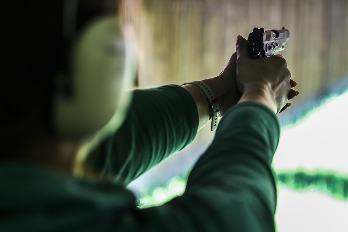 A woman is shooting a handgun at LOK HTS Shooting CLub range in Krakow. in Krakow, Poland on June 11, 2022 (Photo by Beata Zawrzel/NurPhoto via Getty Images)